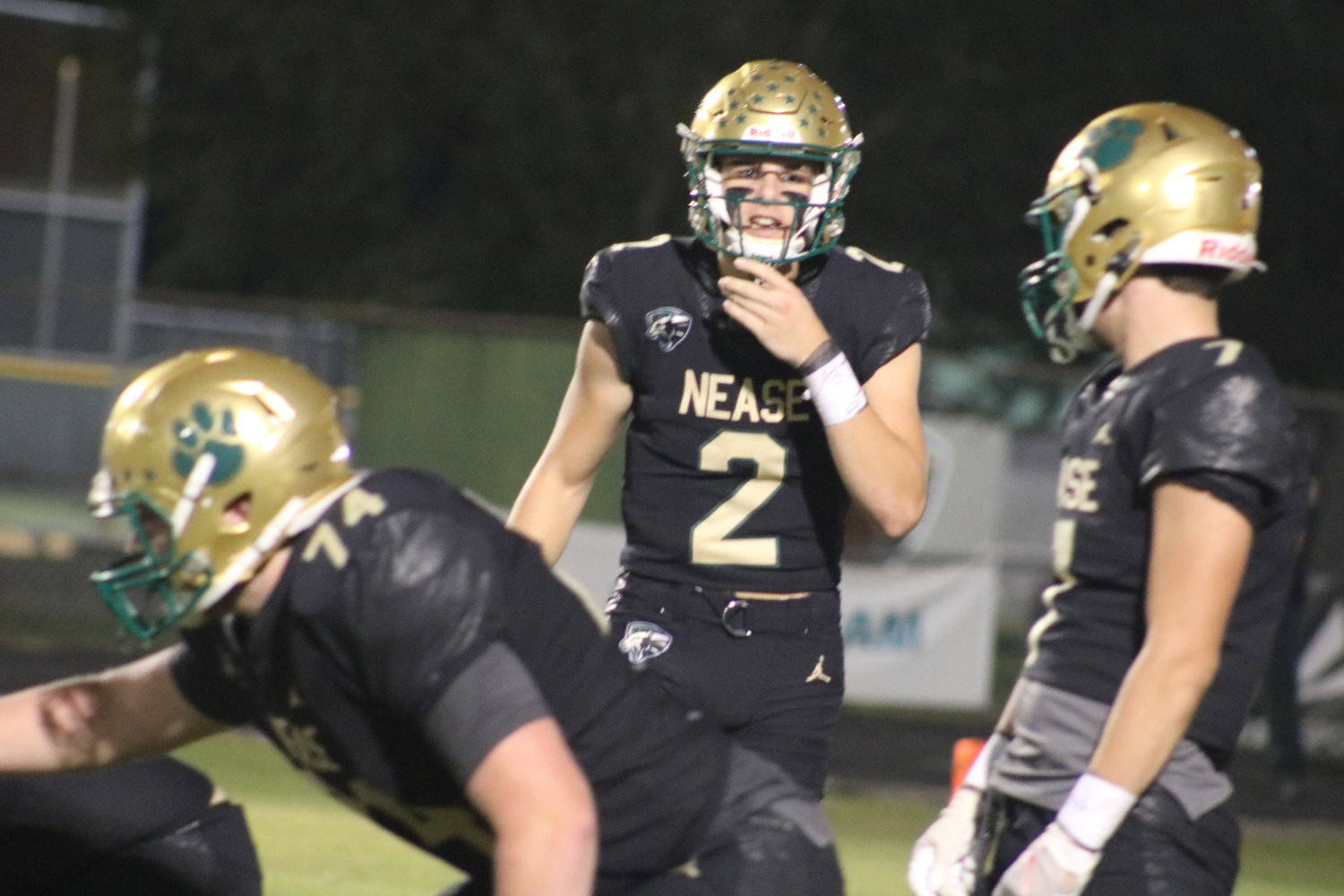 Nease quarterback Marcus Stokes makes an adjustment at the line of scrimmage against First Coast. He finished with five touchdowns on the night, three passing and two rushing.